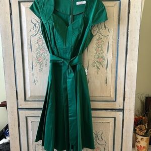 And green dress comes below the knee Eiger dresses star size 12 to 14